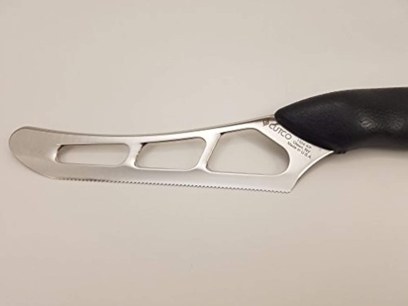 Model 1504 CUTCO Cheese Knife w/ 5.5" Micro-D® serrated edge blade & 5" black Soft Comfort-grip handle. Holes on blade’s surface helps cheese fall away during cutting.