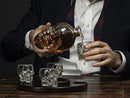 Guzzle Buddy Large Skull Face Decanter with 4 Skull Shot Glasses and Beautiful Wooden Base - By The Wine Savant Use Skull Head Cup For A Whiskey, Scotch and Vodka Shot Glass, 25 Ounce Decanter 3 Ounces Shot Glass