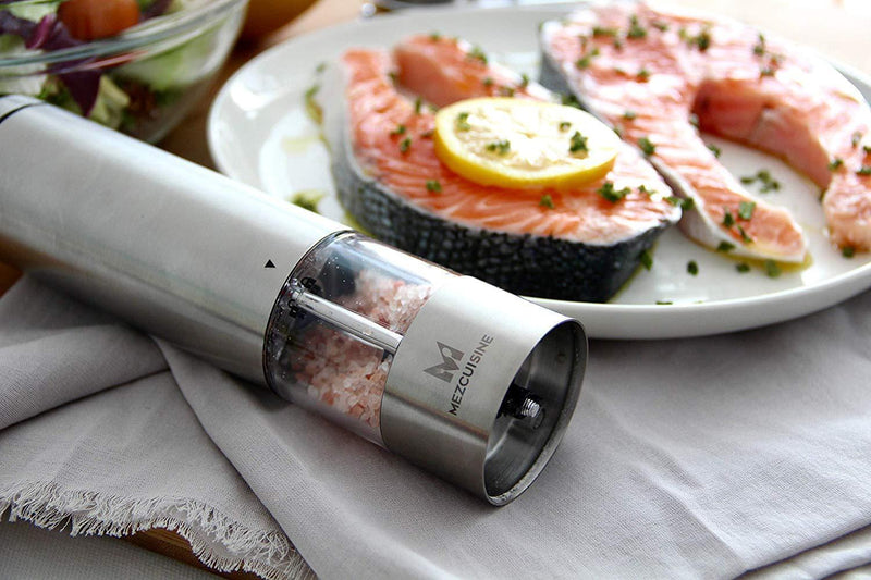Electric Salt and Pepper Grinder Set by Mezcuisine – Premium Stainless Steel Salt&Pepper Mill Battery Operated with LED Light (Pack of 2) – Automatic Adjustable Shakers with Metal Stand